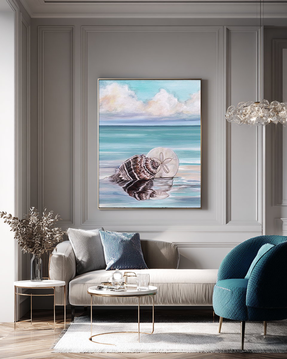 Living room with a painting of a shell on a beach, gray sofa, and blue armchair.