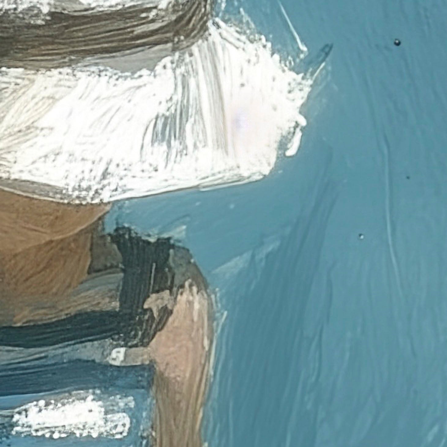 Close-up of a person wearing a white helmet and dark clothing against a blue background
