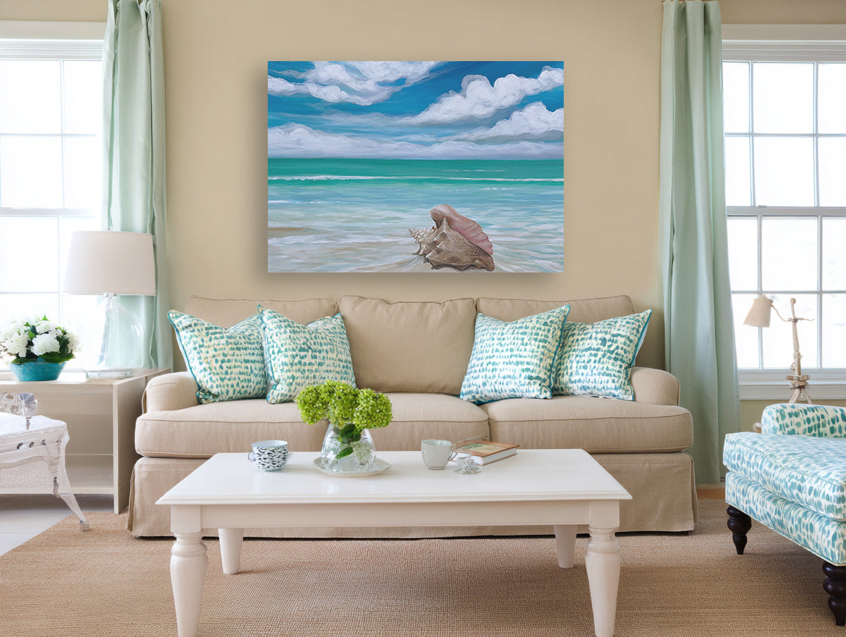 Shoreline Reverie sofa mockup – conch seascape print above a tan sofa in a coastal room
