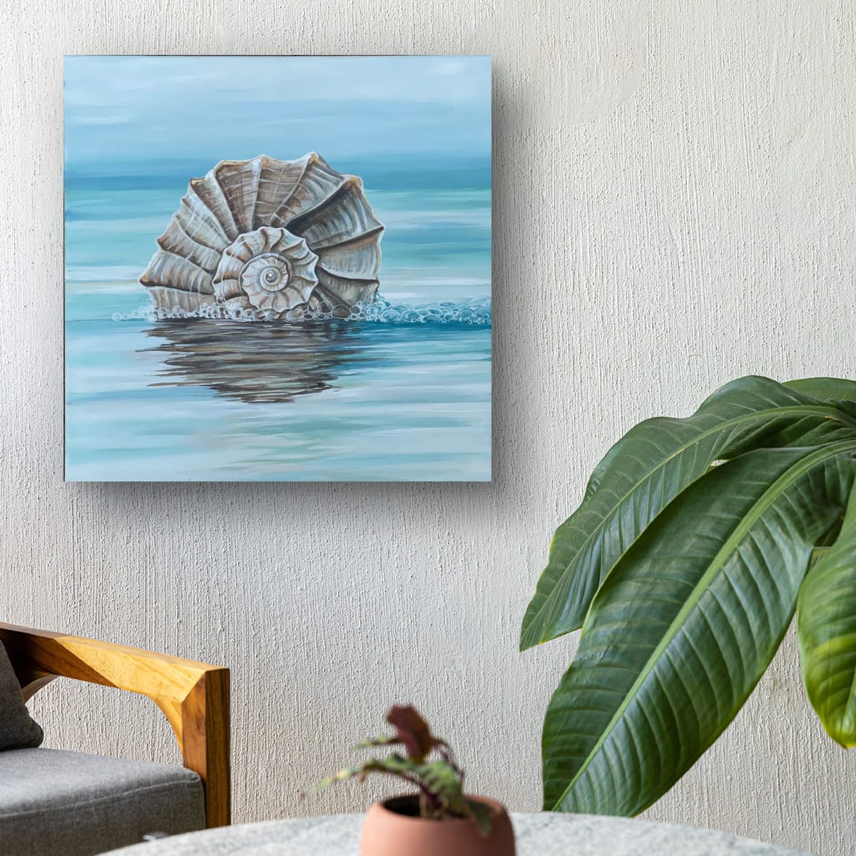 Ocean's Whisper gallery mockup – whelk shell print in a curated interior setting