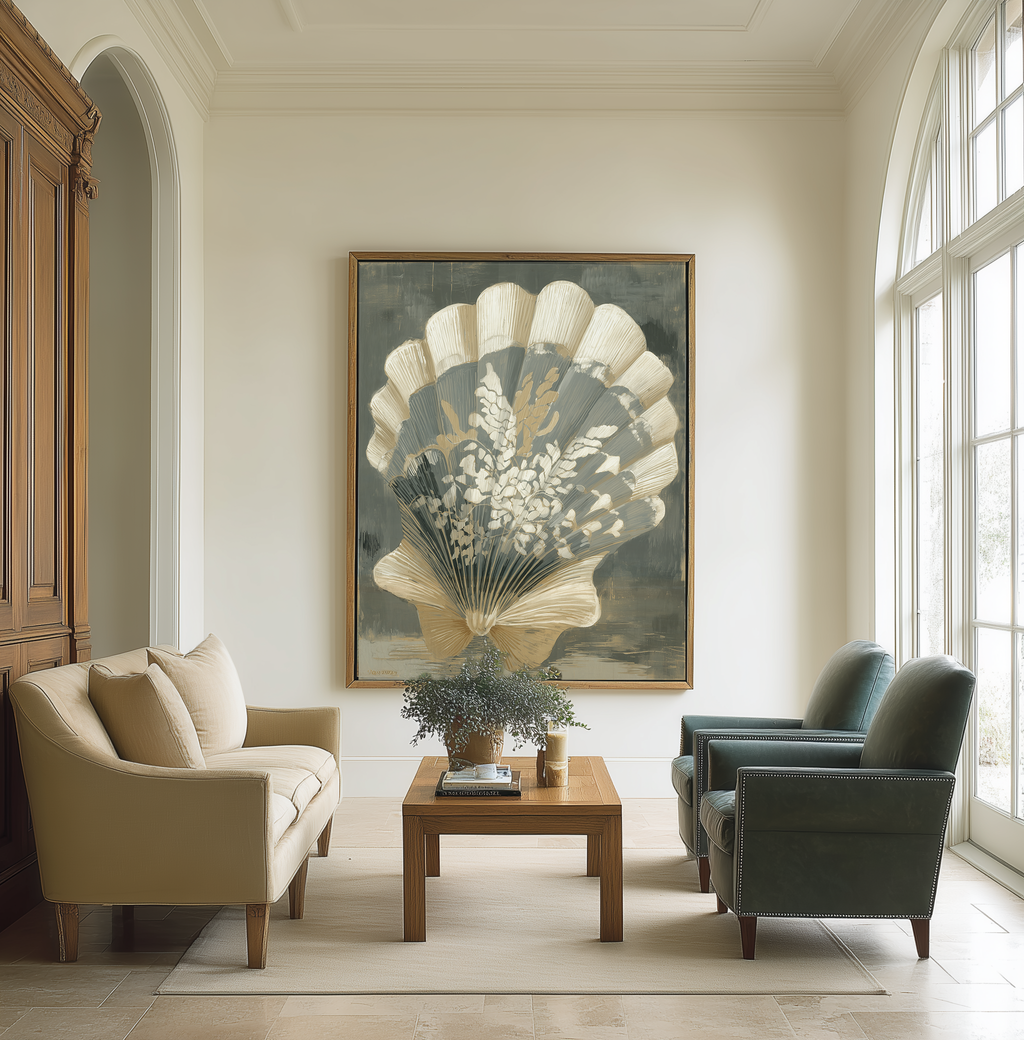 Living room with beige sofa, green armchairs, wooden coffee table, and large shell artwork on wall.
